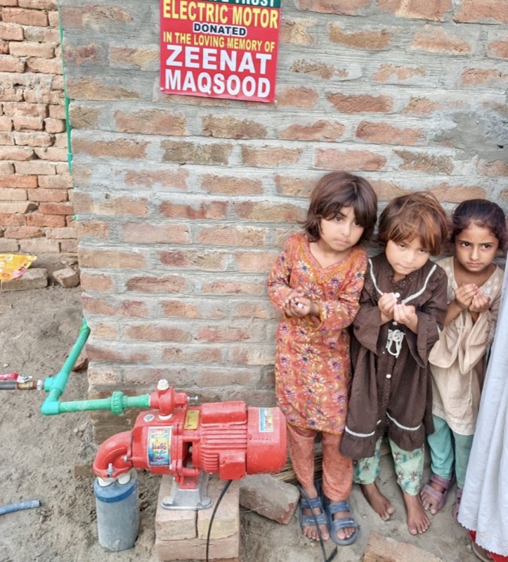 Children by a fitted electric water motor